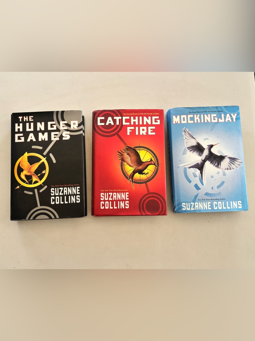 The Hunger Games Trilogy Set by Suzanne Collin’s - Black, Red, Blue
